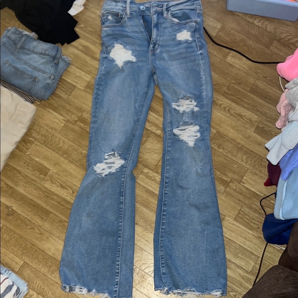 American Eagle Outfitters Flare/ Wide Leg ripped jeans
